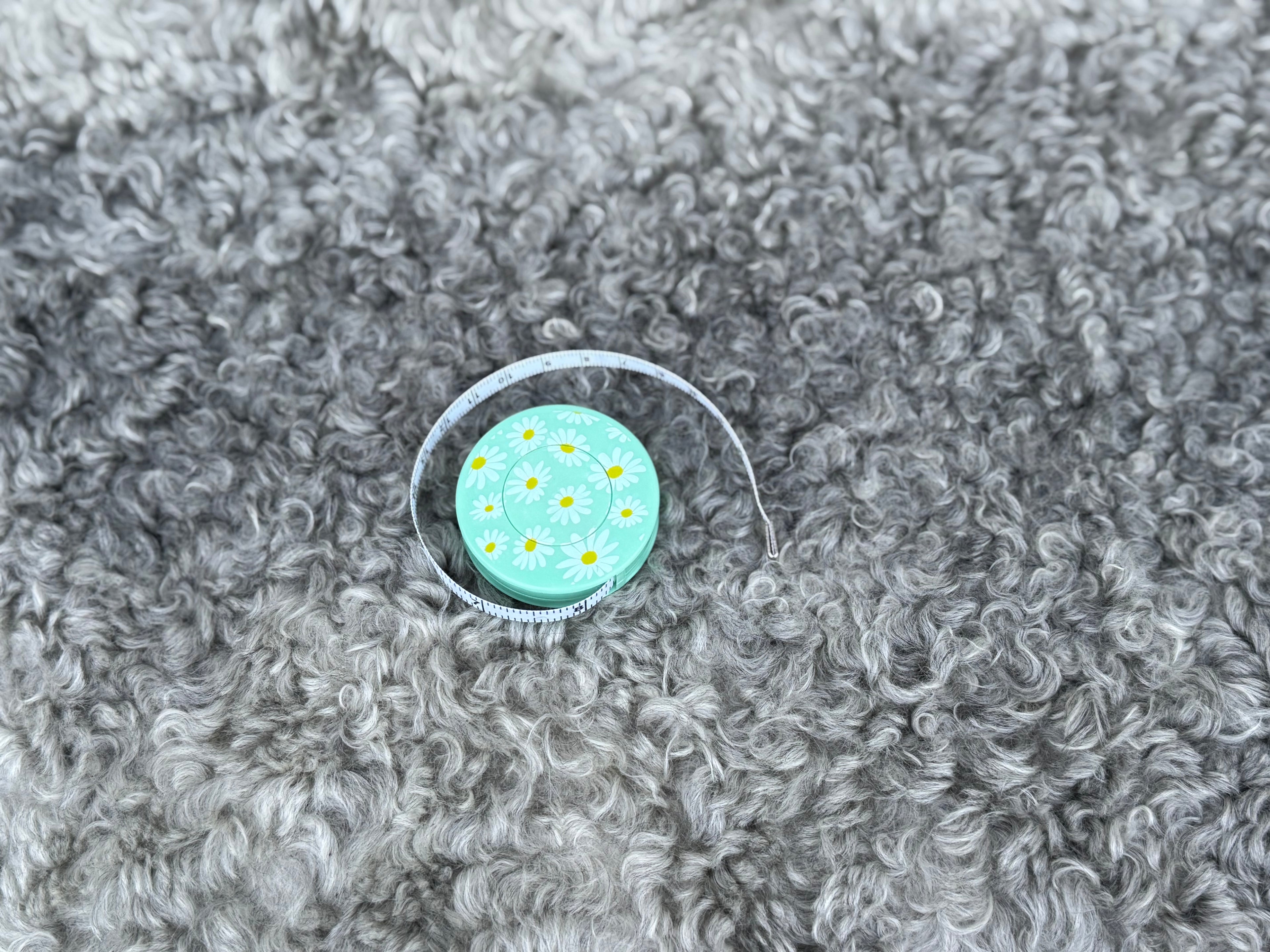 Måttband, prästkragar