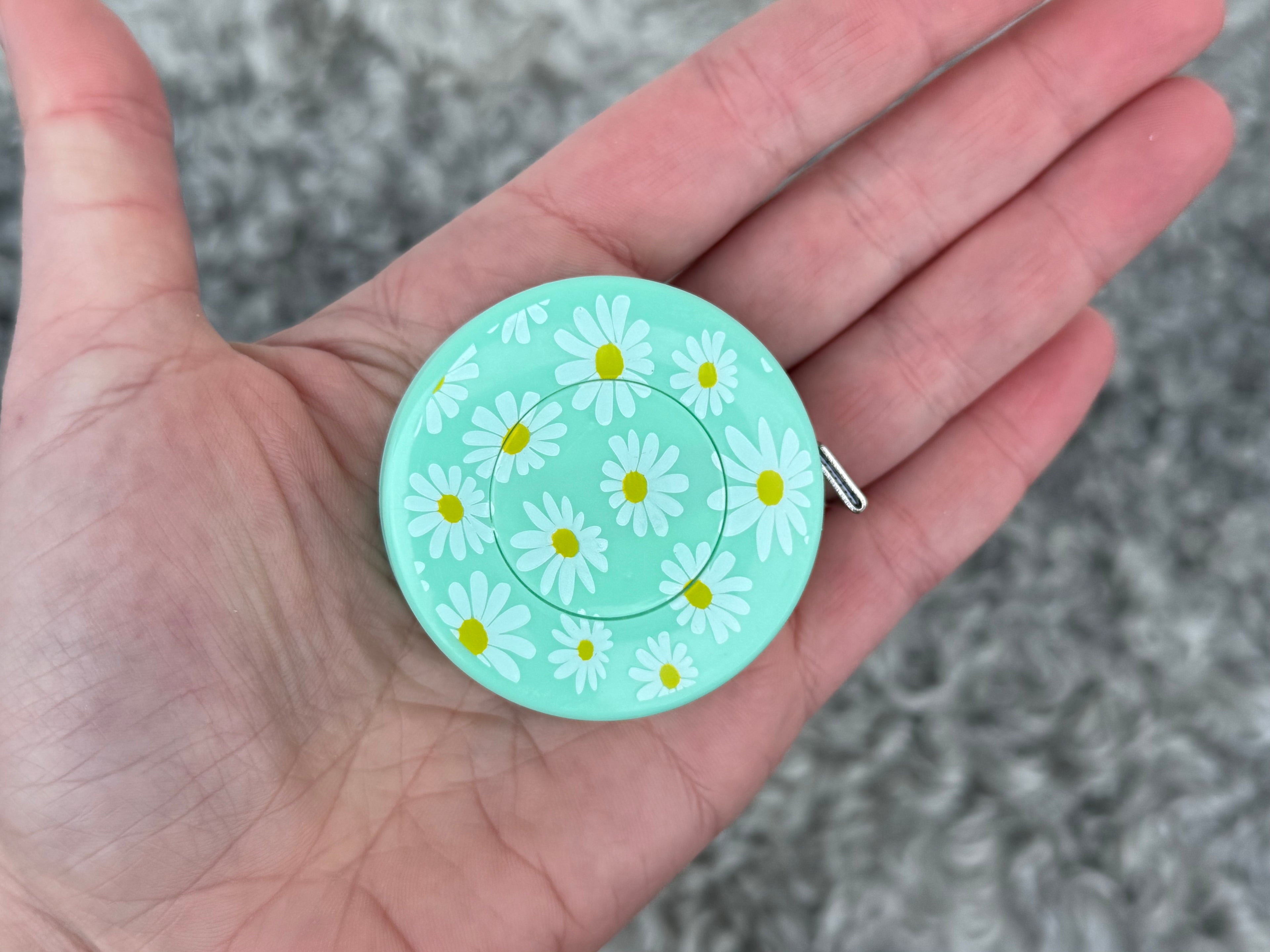 Måttband, prästkragar